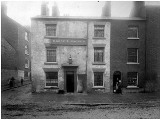 Public house and housing that formerly stood on Store Street, 1896